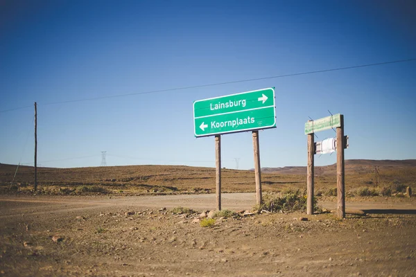 Amplia Vista Angular Las Señales Tráfico Una Dirtroad Región Karoo —  Fotos de Stock