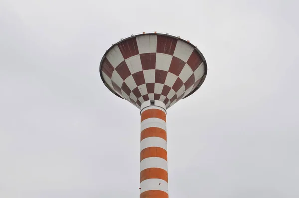 water tower with water tank to pressurise a water supply system for the distribution of potable water