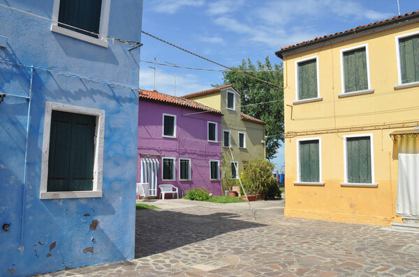 Burano island traditional architecture with bright colours in Venice, Italy