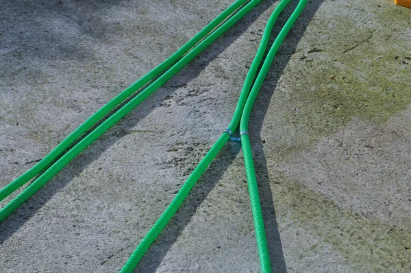 Green corrugated pipe — Stock Photo, Image