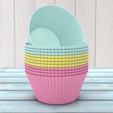 Renkli Cupcake silikon bardak hissesi ahşap bir masa üzerinde. 3D render 