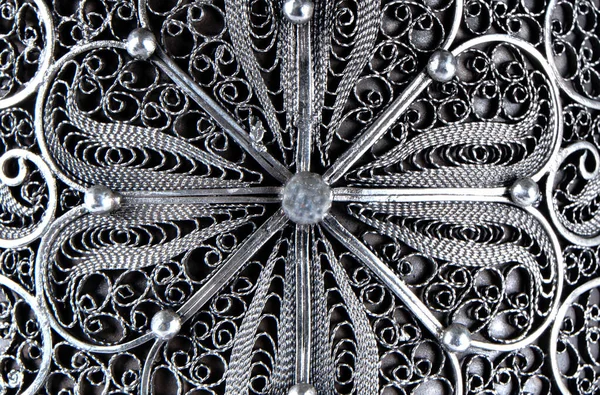 Background, texture of silver jewelry