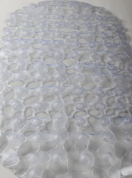 Transparent rubber mat for bath with pattern