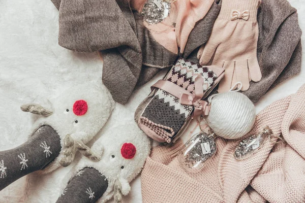 Flat lay cozy winter with fashion winter warm  clothes. Holiday concept