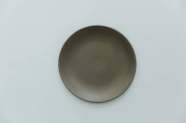 Pastel arka plan boş gri tabakta. Üstten Görünüm 