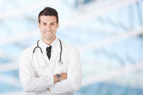 smiling male doctor  - background