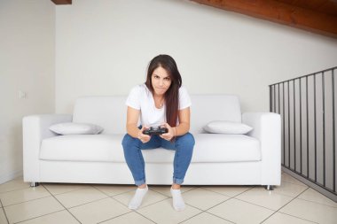 pretty woman play videogames on sofa clipart