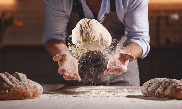 hands of the baker's male knead doug