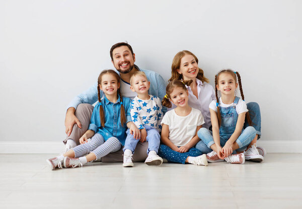 large family mother father and children sons and daughters on wh