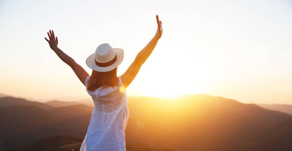 happy girl enjoying nature at sunset 