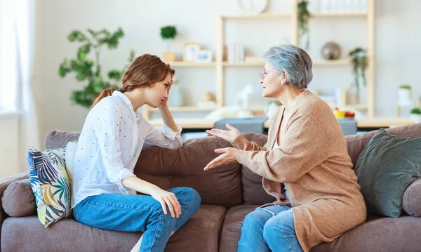 Conflict of family two generations old mother and adult daughter — Stock Photo, Image