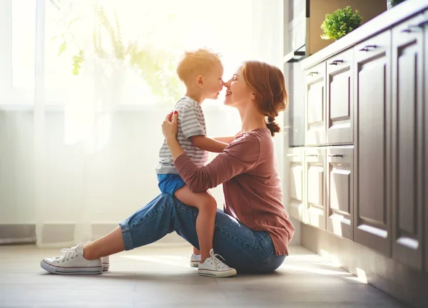 Happy family mother and child son huggin — Stock Photo, Image