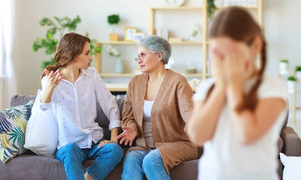 Conflict of family three generations angry mother and grandmothe — Stock Photo, Image