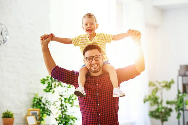 Father's day. Happy family son hugs his dad — Stock Photo, Image