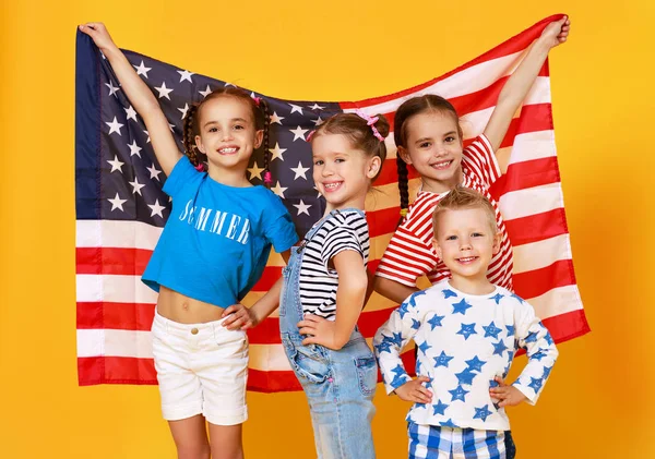 Group of children with flag of   United States of America USA on Stock Photo