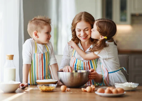 Happy family funny kids bake cookies in kitchen. — Stock Photo, Image