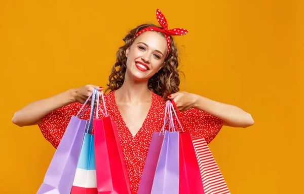Concept of shopping purchases and sales of happy young girl with — Stock Photo, Image