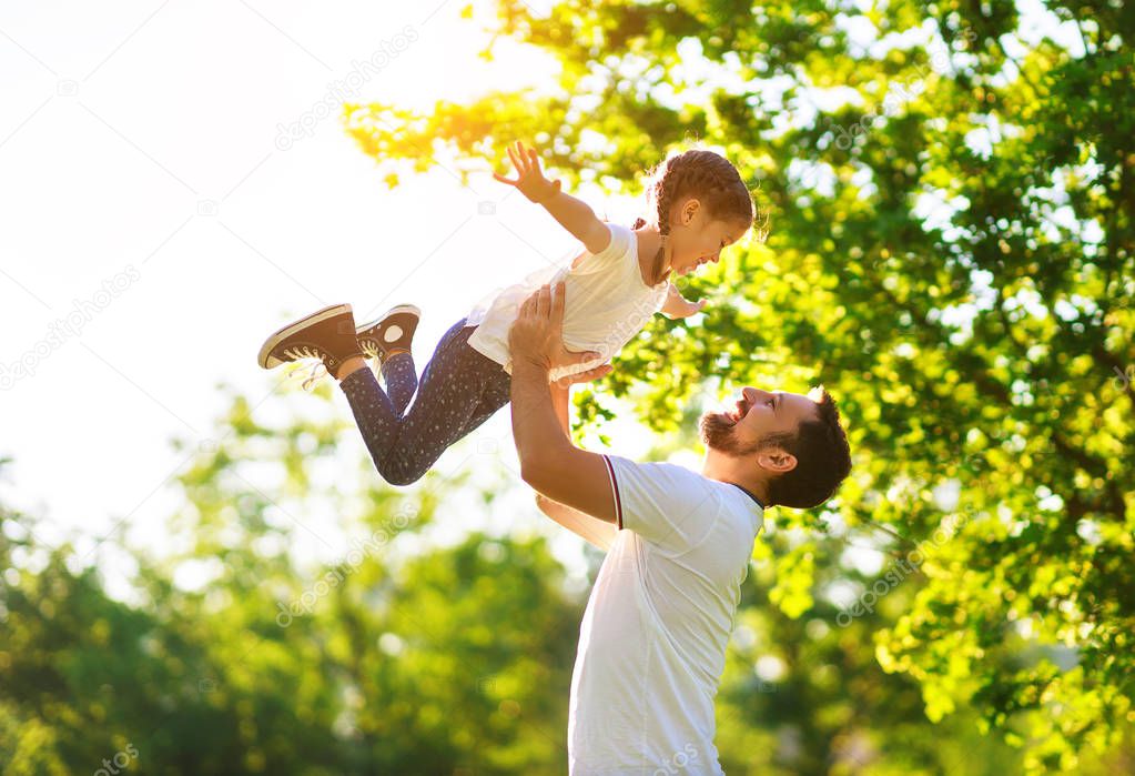 concept of father's day! happy family dad and child daughter    