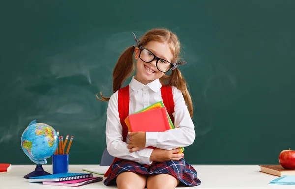 Funny child   schoolgirl  girl student about school blackboard — Stock Photo, Image