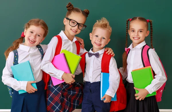 Funny group children   schoolboy  and schoolgirl, student boy  a — Stock Photo, Image
