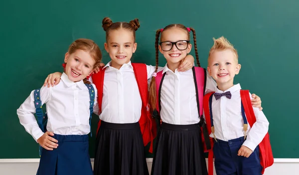 Funny group children   schoolboy  and schoolgirl, student boy  a — Stock Photo, Image