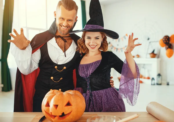 Couple of people are preparing for Halloween in costumes of witc — Stock Photo, Image