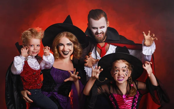 Happy family mother father and children in costumes and makeup o Royalty Free Stock Images