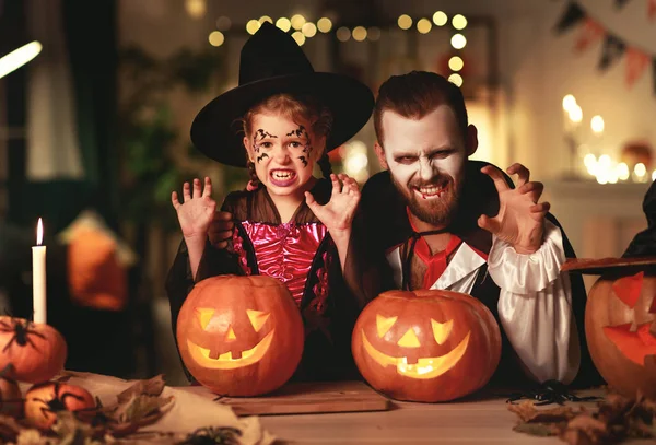 Happy family   father and child daughter in costumes and makeup — Stock Photo, Image