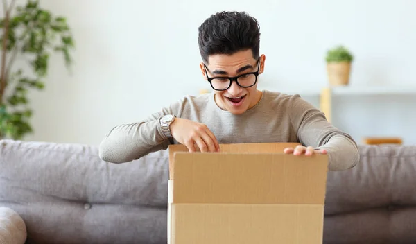 Cheerful Ethnic Man Glasses Smiling Looking Carton Box Delivered Goods — Stock Photo, Image