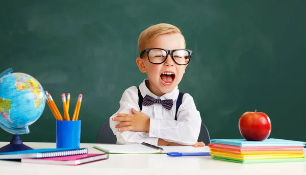 Funny Happy Child Schoolboy Student Sitting Table Laughs School Blackboar — Stock Photo, Image