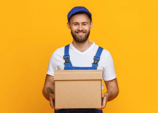 Happy Bearded Delivery Man Smiling Camera Carrying Parcel While Working — Stock Photo, Image