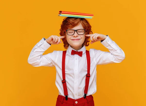 Cute Ginger Boy Stack Textbooks Head Closing Eyes Ears Rejecting — Stock Photo, Image