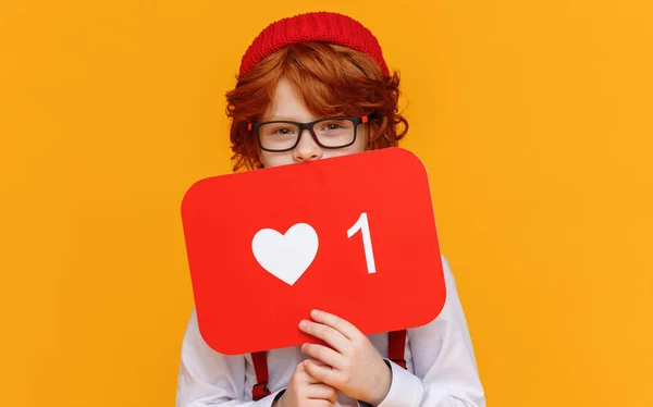 Ginger Boy Trendy Outfit Covering Face Board Symbol Looking Camera — Stock Photo, Image