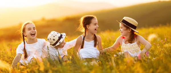 Cheerful Little Kids Casual White Clothes Sit Grass Having Fun — Stock Photo, Image