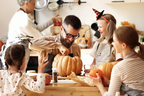 Happy Multi Generational Family Smiling Carving Jack Lantern Pumpkin While — Stock Photo, Image