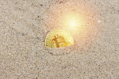 Altın bitcoins kum üzerinde. Bitcoins ve yeni sanal para kavramı 