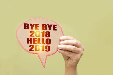 closeup el güle güle güle güle 2018 Merhaba 2019 konuşma balonu tutan kadın