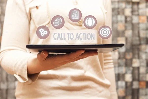 woman holding tablet with  Call To Action. Business photo showcasing exhortation do something in order achieve aim with problem.
