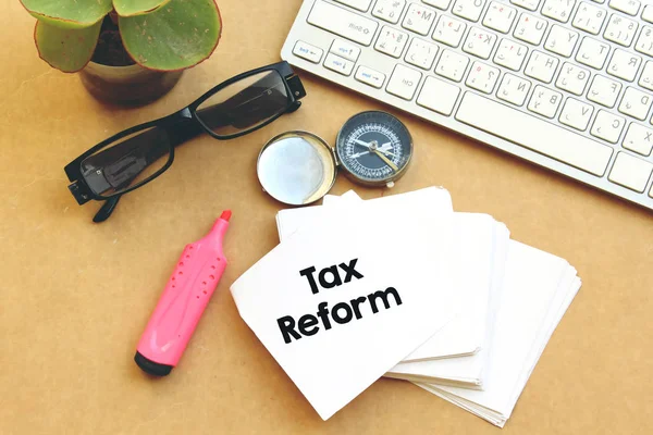 Tax Reform. Business Papers, Note And keyboard, eyeglasses.