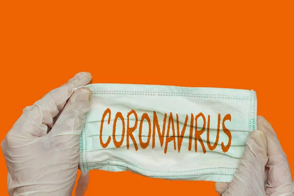 Hans Trägt Medizinische Handschuhe Mit Maske Mit Coronavirus Text — Stockfoto