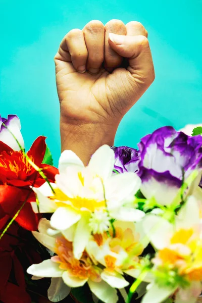 Hand symbol black lives matter protest in USA to stop violence to black people with flowers. Fight for human right of Black People in U.S. America.