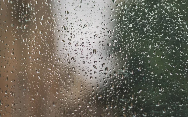 Rain drops on the window glass. Autumn and fall concept. — Stock Photo, Image