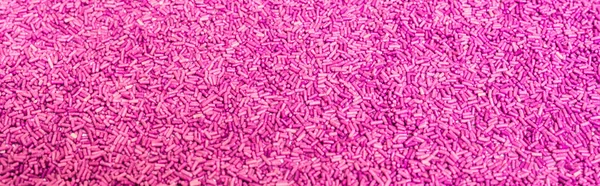 Antecedentes de polvilhas roxas coloridas. Textura e padrão alimentar . — Fotografia de Stock