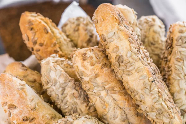 Organic bread loafs at a street food market. Selective focus. — Stock Photo, Image