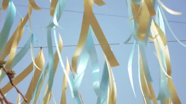 Decorative ribbons on a wire — Stock Video