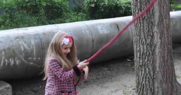 Fall girl on the playground — Stock Video