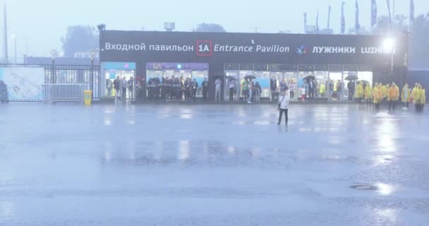 Football fans under the shower after the completion of the stadium — Stock Video