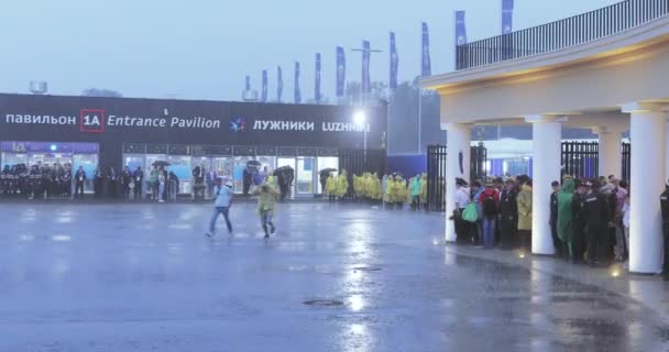 Football fans under the shower after the completion of the stadium — Stock Video