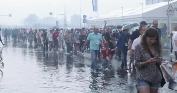 Football fans under the shower after the completion of the stadium — Stockvideo