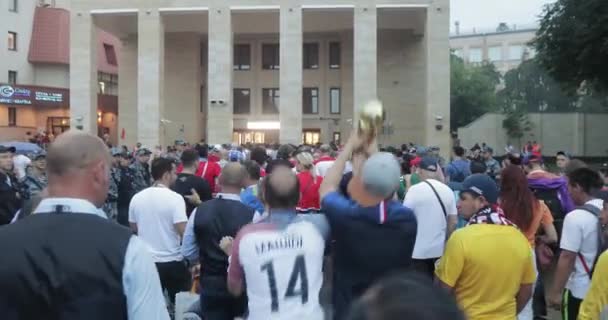 Football fans walking in the metro — Stock Video